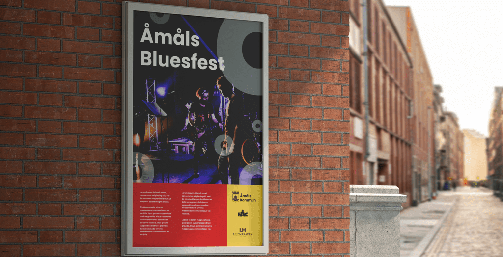 Reklamskylt på husvägg